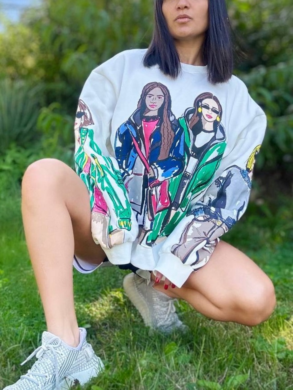 Women Stylish White Graphic Sweatshirt with Colorful Illustrated Figures